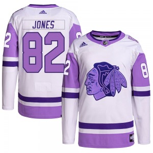 Adult Authentic Chicago Blackhawks Caleb Jones White/Purple Hockey Fights Cancer Primegreen Official Adidas Jersey