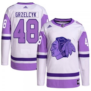 Adult Authentic Chicago Blackhawks Matt Grzelcyk White/Purple Hockey Fights Cancer Primegreen Official Adidas Jersey